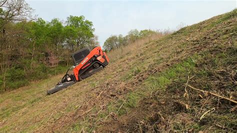 side hill skid steer|slopes mowing with skids.